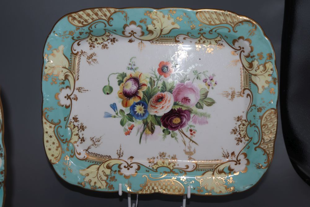 A pair of Victorian floral and gilt porcelain dishes, width 27cm